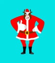Santa bull thumbs up well and winks. Sign all right. Merry Christmas cow. Hand showing ok. Gesture of hand. Good farm animal in