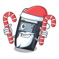 Santa with candy EDC machine on the character cardboard Royalty Free Stock Photo
