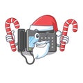 Santa with candy fax machine stuck the cartoon wall Royalty Free Stock Photo