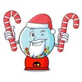 Santa with candy gumball machine mascot cartoon Royalty Free Stock Photo