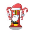 Santa with candy hammer game machine with the cartoon Royalty Free Stock Photo