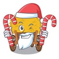 Santa with candy miniature haydire above cartoon wood table Royalty Free Stock Photo