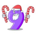 Santa with candy paper cut number Nine letter mascot Royalty Free Stock Photo