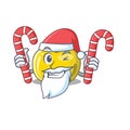 Santa with candy yellow apple in a cartoon basket