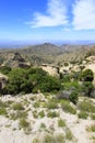 Santa Catalina Mountains with deep blue sky and whispy white clouds in Arizona, USA Royalty Free Stock Photo