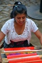 Portrait of a Mayan woman weaving a tissus. Royalty Free Stock Photo