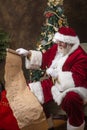 Santa checking his list Royalty Free Stock Photo