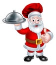 Santa Christmas Chef Holding Plate of Food Royalty Free Stock Photo