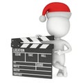 Santa with cinema clapperboard.