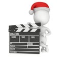 Santa with cinema clapperboard.