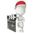 Santa with cinema clapperboard.