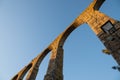 Santa Clara Aqueduct in Vila do Conde, Portugal from below at dusk, looking up under arches