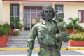 SANTA CLARA, CUBA - APRIL 10: statue of Guevara with a child in Royalty Free Stock Photo