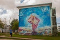 Santa Clara, Cuba: The house on which the drawing is made paints. Graffiti on the building.