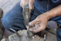 Santa Clara del Cobre, Mexico: coppersmith`s hand Royalty Free Stock Photo
