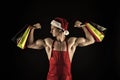 Santa claus for adult. Sexy athletic macho muscular chest in santa claus hat. Athlete muscular man wear santa hat and Royalty Free Stock Photo