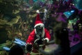 Santa Claus with aqualung under water