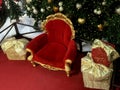 Santa Claus armchair and gifts Christmas tree