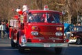 Santa Claus arrives on a firetruck