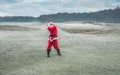 Santa Claus as a golfer in motion Royalty Free Stock Photo