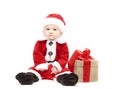 Santa Claus baby in red christmas clothes with gift box isolated on white Royalty Free Stock Photo