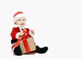 Santa Claus baby in red christmas clothes with gift box isolated on white Royalty Free Stock Photo