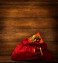 Santa Claus Bag, Christmas Red Sackful, Brown Wooden Background