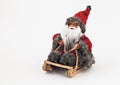 Santa Claus with a beard on a sled tree toy isolated Royalty Free Stock Photo