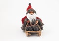 Santa Claus with a beard on a sled tree toy isolated Royalty Free Stock Photo