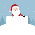 santa claus behind empty blank banner showing winter landscape snowy background Royalty Free Stock Photo