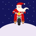 Santa Claus biker rides a motorcycle at night Royalty Free Stock Photo