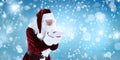 Santa Claus blowing magic snow around, bokeh effect. Space for text Royalty Free Stock Photo