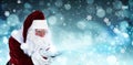 Santa Claus blowing magic snow around, bokeh effect. Space for text Royalty Free Stock Photo