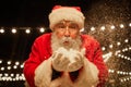 Santa Claus Blowing Snow Royalty Free Stock Photo