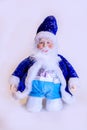 Santa Claus in blue suit close up on white background Royalty Free Stock Photo