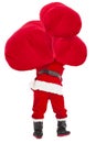 Santa claus carrying heavy gift bag