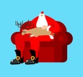 Santa Claus on chair stroking deer sleep. Christmas and New Year