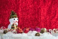 Santa Claus and Christmas balls on snow. Royalty Free Stock Photo