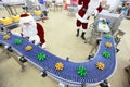 santa claus at christmas ornament production line