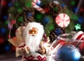 Santa Claus and Christmas tree toys in a round glass vase Royalty Free Stock Photo