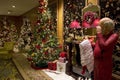 Santa Claus Christmas trees lights luxury hotel lobby