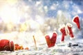 Santa claus clothes lying on a rope on snowy landscape