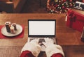 Santa Claus connecting with his laptop Royalty Free Stock Photo