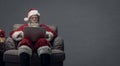 Santa Claus connecting with a laptop Royalty Free Stock Photo