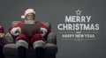 Santa Claus connecting with a laptop Royalty Free Stock Photo