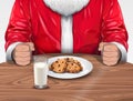 Santa Claus with Cookies and Milk Royalty Free Stock Photo