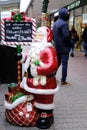 Santa claus and decorated with balls, garlands shopping mall Main Taunus Center, people go shopping, buy gifts, winter christmas Royalty Free Stock Photo