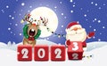 Santa Claus and decorated Reindeer with wreath and luminous electric garland changing date from 2022 to 2023 rotating cubes with