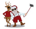 Santa Claus and deer make photo