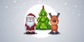 Santa Claus and a deer stand on the background of a Christmas tree among the falling snow. Composition of three objects.